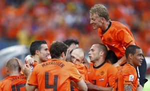 Netherlands players celebrate after Robben scored a goal during their 2010 World Cup second round soccer match against Slovakia in Durban